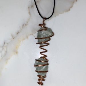 Double fluorite crystal with copper necklace